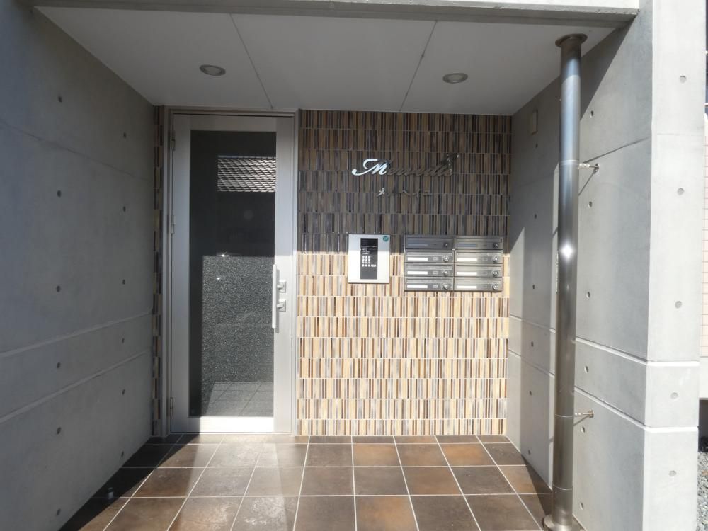 �É����܈�s�|�V��11-6�̃}���V�����̌����O��